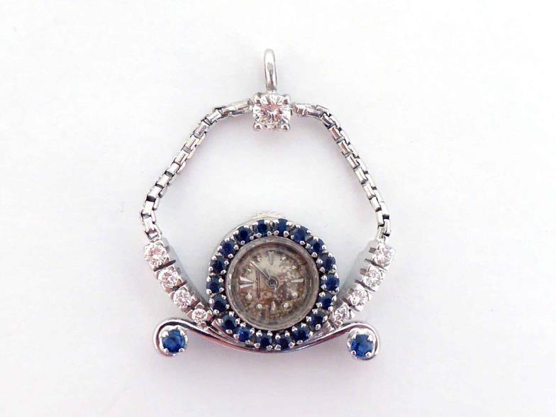 A 1950s sapphire and diamond pendant watch by Jaeger LeCoultre, the bezel set with small round cut