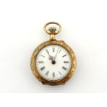 A late 19th century silver-gilt fob watch, the four-piece case with French import marks, the white