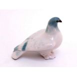 A vintage Russian porcelain dove, the base with the early Lomonosov blue backstamp. In excellent