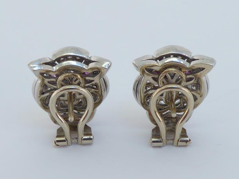 A pair of diamond and ruby ear clips, designed as panther heads, pave set overall with ruby set - Image 2 of 3