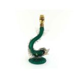 A Venetian glass dolphin lamp, the green body with clear glass fins and gold flake inclusions. In