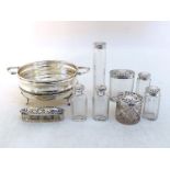 A group of six late Victorian silver-mounted fluted glass dressing table bottles byThomas