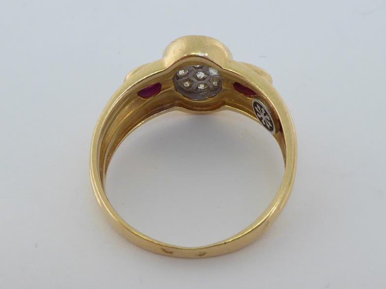 A French 18 carat gold, diamond and ruby ring, with a central pave set oval of small brilliants, - Image 2 of 4