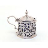 A Victorian silver octagonal mustard pot by Yapp & Woodward, Birmingham, 1847, with conical