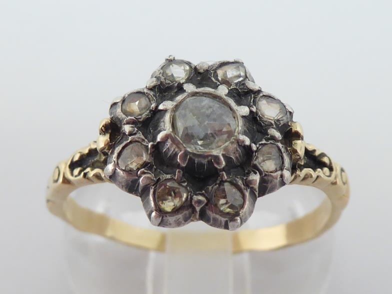 A 19th century diamond cluster ring, the central rose cut 3.8mm diameter, in a surround of smaller - Image 2 of 4