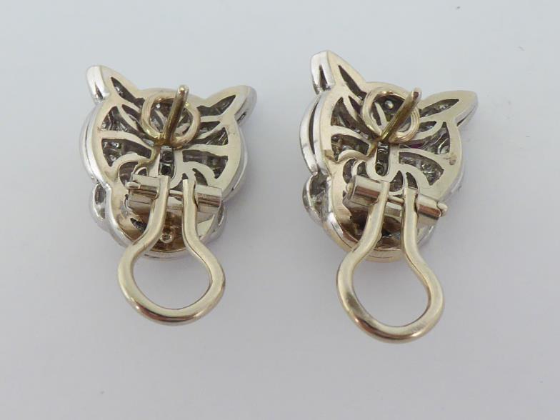 A pair of diamond and ruby ear clips, designed as panther heads, pave set overall with ruby set - Image 3 of 3
