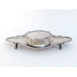 An Edwardian silver trinket box by T. H. Hazlewood & Co., Birmingham, 1908, oval with escutcheon-