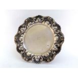 A Portuguese silver platter of shaped circular form, .833 standard, Porto, post 1938, embossed