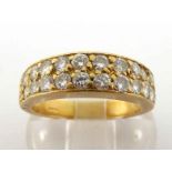 A diamond band ring, composed of two rows of brilliants, totalling approx. 0.90 carat, mounted in