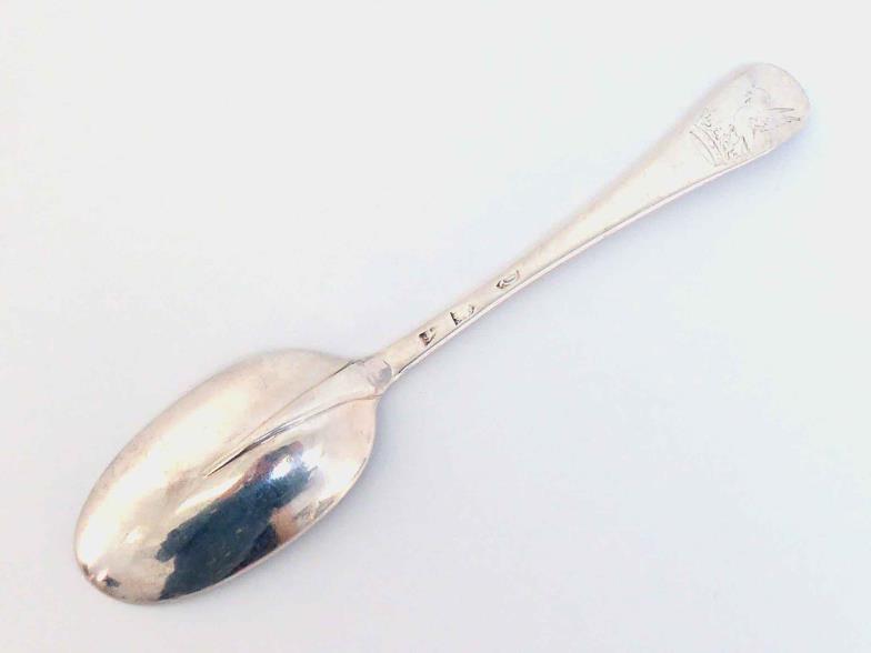 A George II silver rat-tail table spoon, no maker's mark, London, 1731, engraved with contemporary