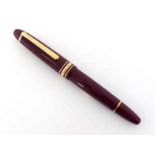 248542 Montblanc Meisterstuck 146, a burgundy resin fountain pen, with fine nib, ink window, and