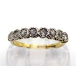 An 18 carat gold and diamond half hoop ring, set with eight uniform eight-cuts, finger size K, 2.