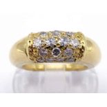 Van Cleef & Arpels, an 18 carat gold and diamond 'Philippine' dress ring, pave set with 18 single