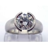 A diamond single stone ring, the brilliant cut approx. 1.55-1.60 carat, rub over set, the white