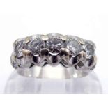 A diamond five stone ring, the uniform brilliants totalling approx. 0.80 carat, mounted in white