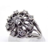 A diamond cluster dress ring, the cluster composed of nine brilliants totalling approx. 0.34