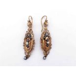 A pair of French 18 carat gold, diamond and seed pearl earrings, the cartouche drop pierced and