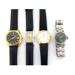 A mixed lot of mid-size/gentleman's wristwatches, including a Seiko 17 jewel gilt example. a Raymond