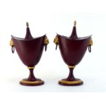 A pair of painted pewter urns in the Adam style, the oval urn-shaped bodies with covers having acorn