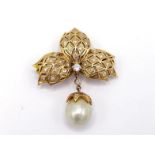 A yellow metal (tests 14 carat gold), diamond and South Sea cultured pearl brooch, the trellis