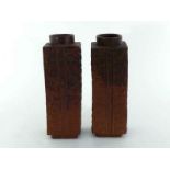 A pair of Chinese rust-coloured stone ware Cong vases, of square cylindrical form with cylindrical