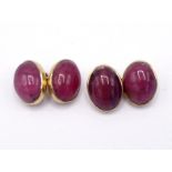 A pair of 9 carat gold and rhodonite cufflinks, the oval 16mm long cabochons rub over set, to