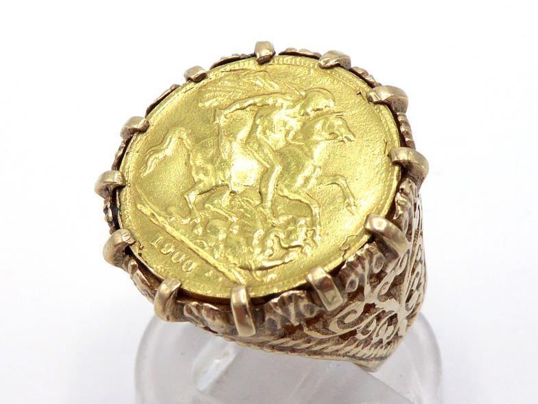 A gold half sovereign ring, mounted in yellow metal stamped '9ct', finger size N, 8.7gms