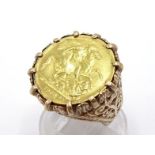 A gold half sovereign ring, mounted in yellow metal stamped '9ct', finger size N, 8.7gms