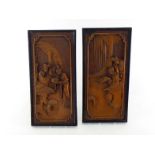 A pair of Chinese carved wood panels depicting ladies reading in a garden, 20th century, in good