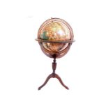 A reproduction 16th. century globe on stand, circa 1970, with zodiac circle and brass mounted