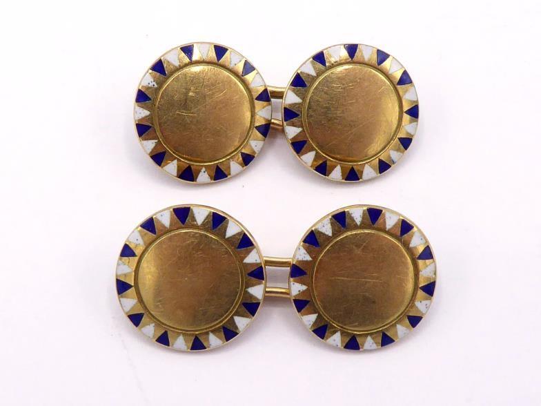 A pair of French 18 carat gold and enamel cufflinks, the circular links with blue and white dart