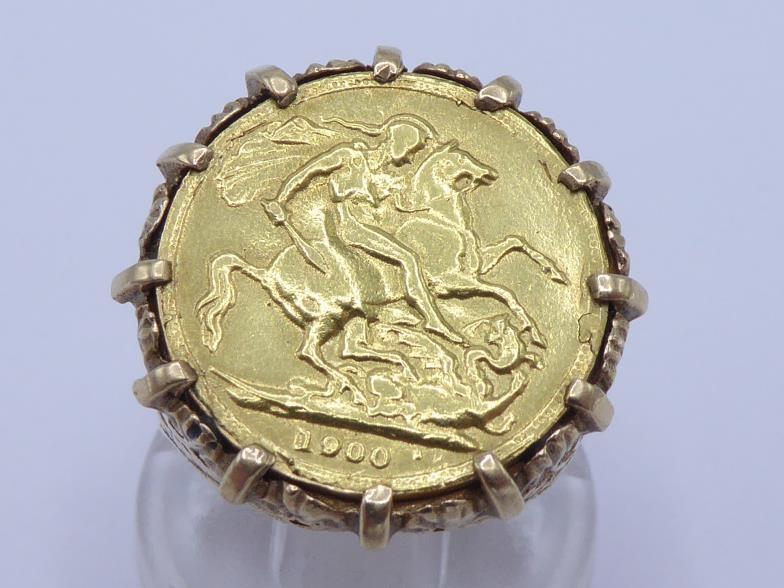 A gold half sovereign ring, mounted in yellow metal stamped '9ct', finger size N, 8.7gms - Image 2 of 4