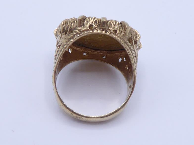 A gold half sovereign ring, mounted in yellow metal stamped '9ct', finger size N, 8.7gms - Image 3 of 4