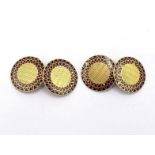 A pair of gold and enamel cuflinks, the circular links with black and red enamel dart border, 13mm