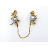 An Italian 18 carat gold and baroque pearl double-brooch, finely modelled as a pair of animated