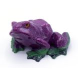 A green and mauve hardstone frog, carved to take advantage of the natural variations in colour,