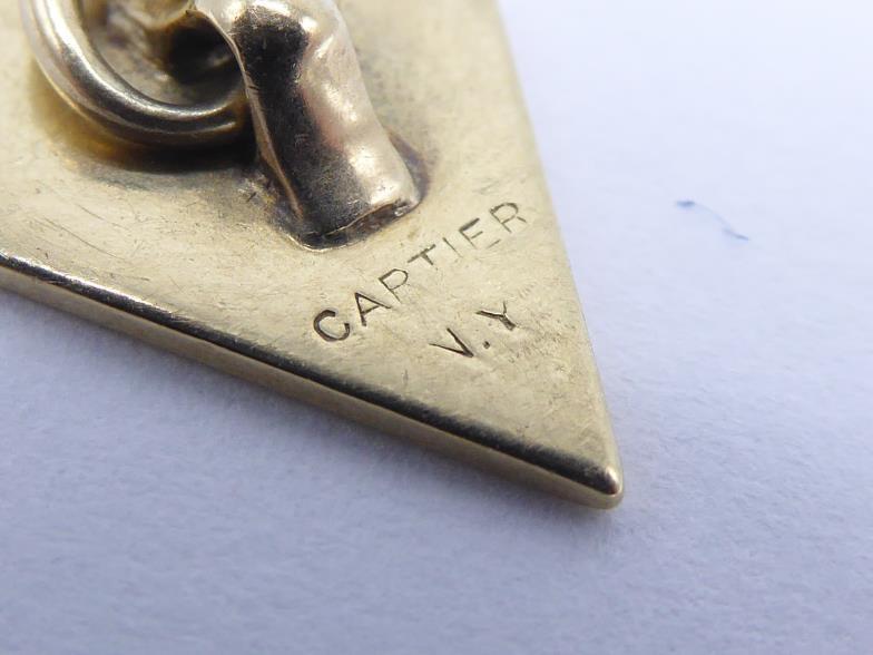 Cartier, a pair of gold cufflinks, the rhomboid links stamped 'CARTIER N.Y' verso, to chain - Image 3 of 3