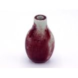 A Chinese porcelain flambé-glazed snuff bottle, in the form of drop shaped, 19th/20th century, in