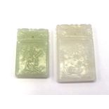 Two Chinese carved white jade plaques in rectangular form, one depicting landscape view with