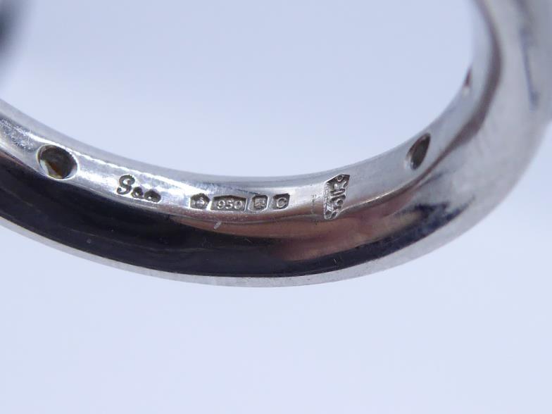 A platinum and diamond eternity band by Garrard & Co, the band rub over set at intervals with twelve - Image 3 of 3
