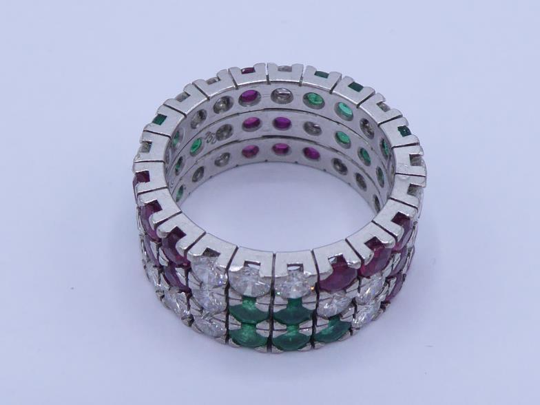 A ruby, emerald and diamond ring, a three row grid pattern of pave set round cut emeralds, rubies - Image 2 of 3