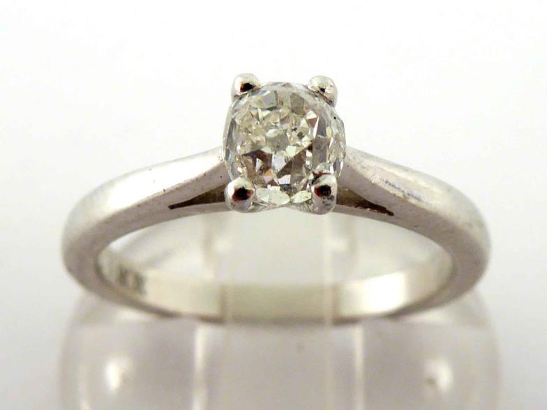 A single stone diamond ring, the mine cut approx. 0.50 carat, mounted in platinum, fully hallmarked,