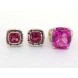 A synthetic pink sapphire dress ring by John Hardy, the large rectangular cushion cut stone