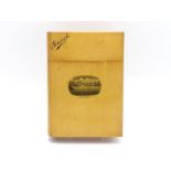 A Mauchlin Ware case in the shape of a book, for holding early cabinet photographs, marked "