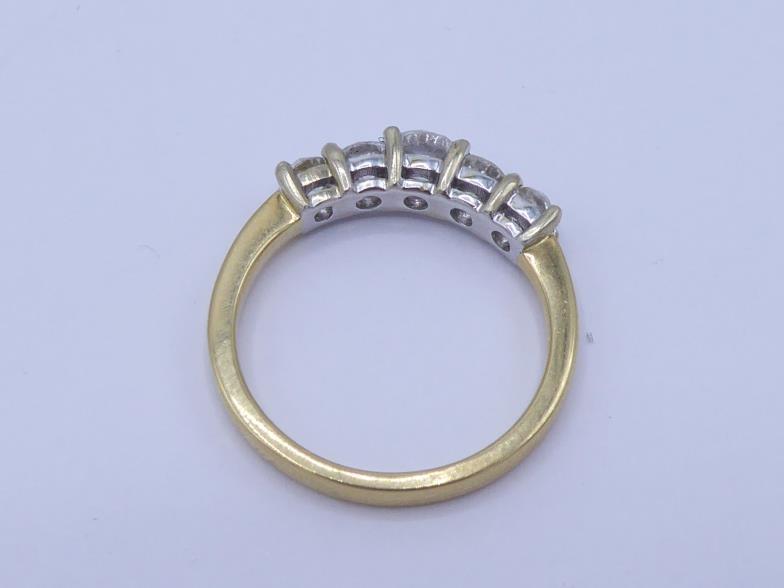 A five stone diamond ring, composed of graduated modern and old cut stones, the centre stone approx. - Image 3 of 3