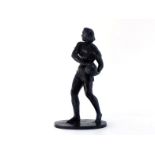 A Soviet Russian Kasli cast iron figure of a young female barefoot basketball player about to shoot,