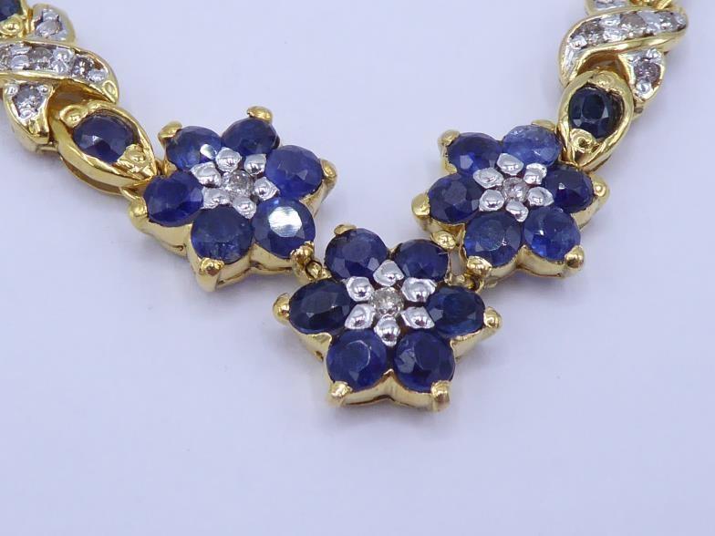 A sapphire and diamond necklace, composed of alternate daisy clusters of sapphires and pave set - Image 2 of 5