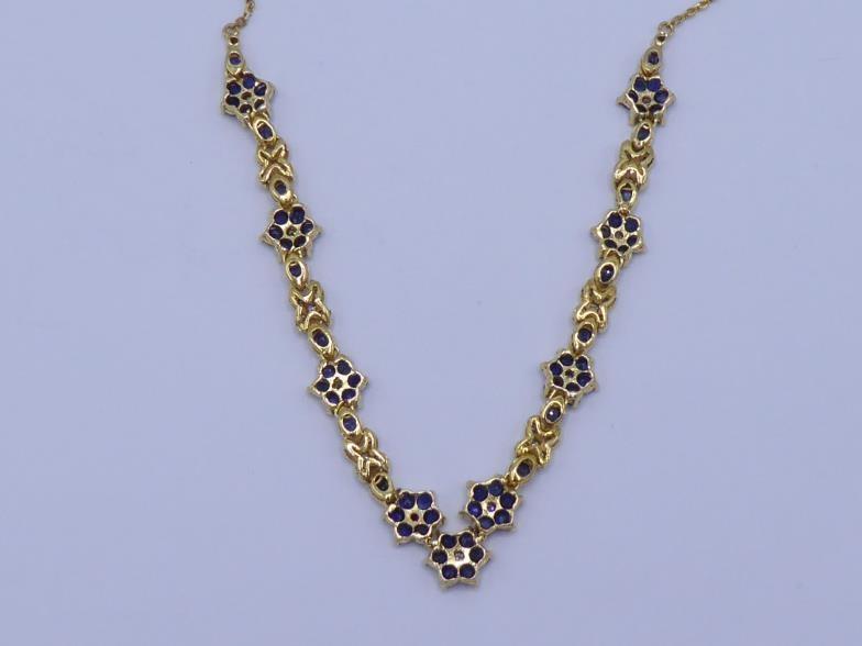 A sapphire and diamond necklace, composed of alternate daisy clusters of sapphires and pave set - Image 5 of 5