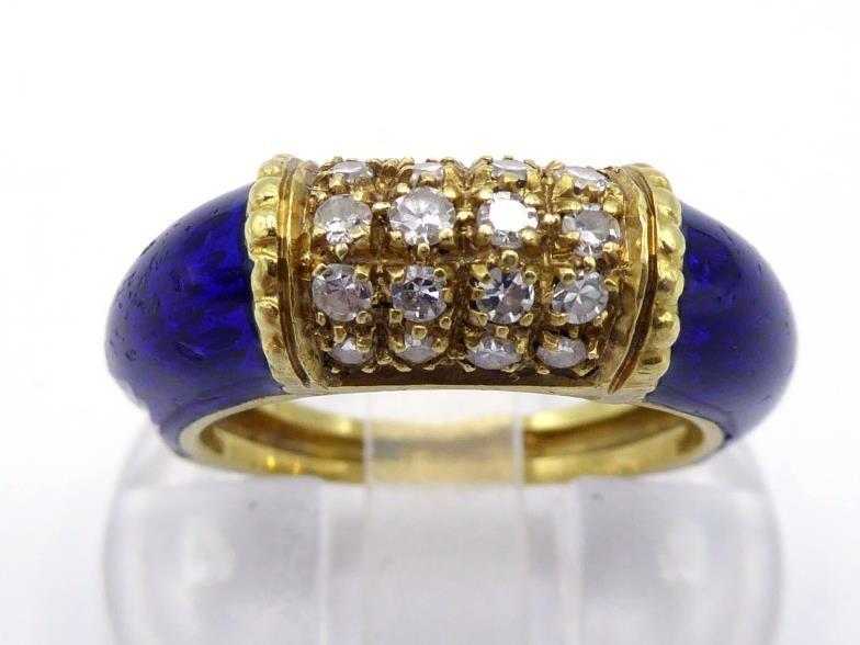 A diamond and enamel dress ring, set to the centre with a panel of 16 small eight-cuts, to blue