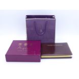 Asprey, a leather bound address and telephone book, 16 x 14cm, in its box CONDITION: unused